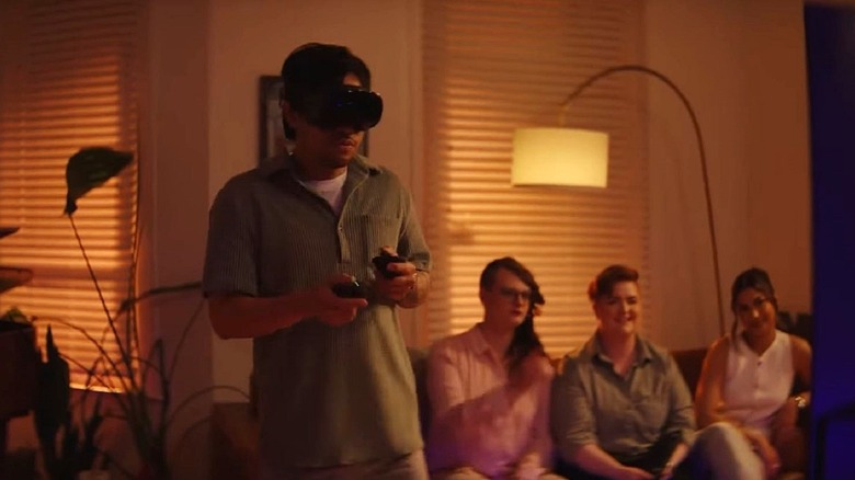 Someone using the Steam Frame VR headset to play games.