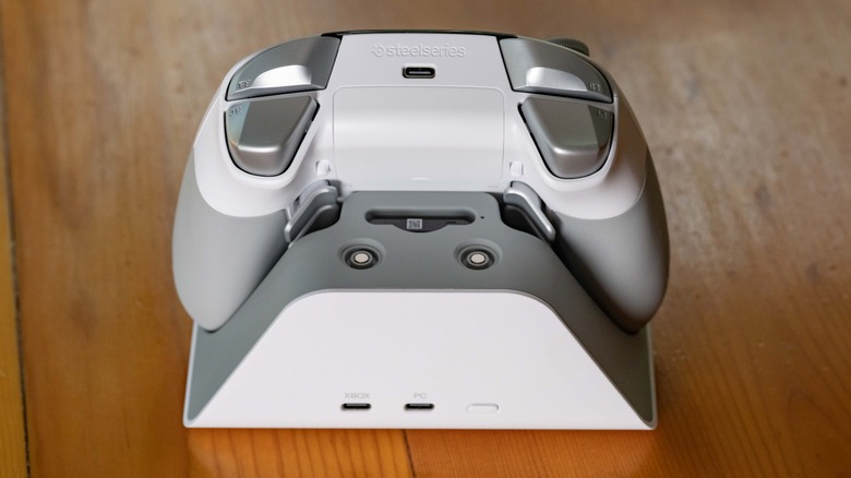 The SteelSeries Aeon Pro on its charging stand.