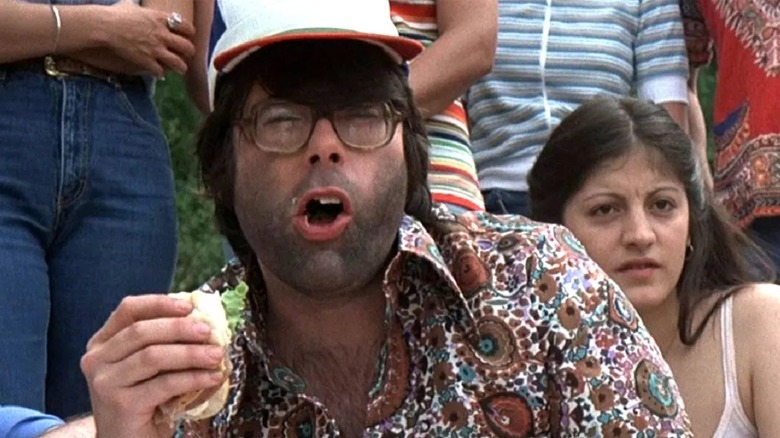 Hoagie man eating his sandwich with an open mouth