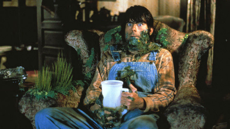 Jordy Verrill sitting in his armchair covered in dirt