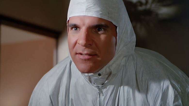 Michael (Steve Martin) hunched over in 