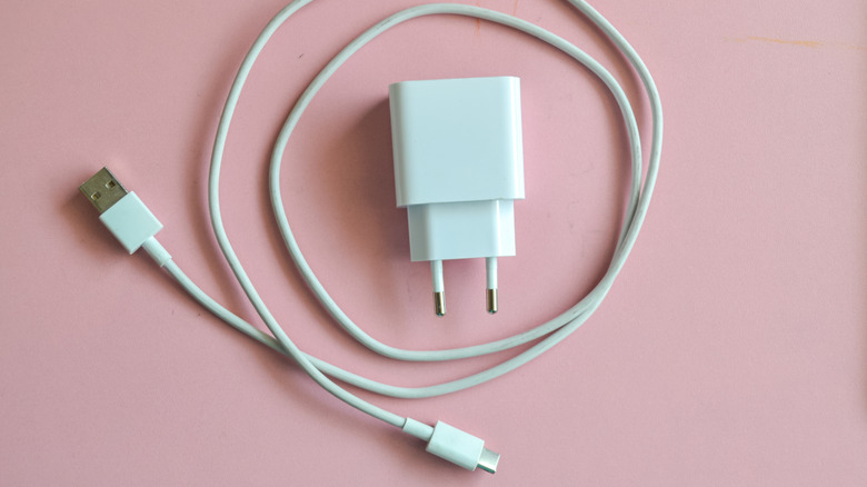 A white USB cable and adapter