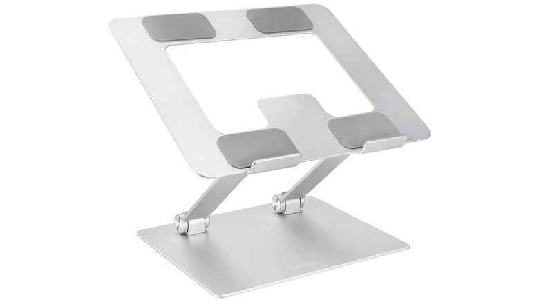 A promotional photo for the Amazon Basics Ergonomic Laptop Stand, showcasing how the stand looks standing upright without a laptop or tablet