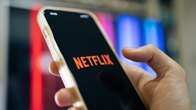 the Netflix logo on a phone