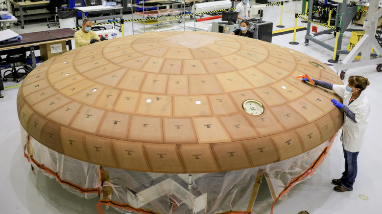 The NASA Orion space capsule's heat shield seen during pre-launch inspections