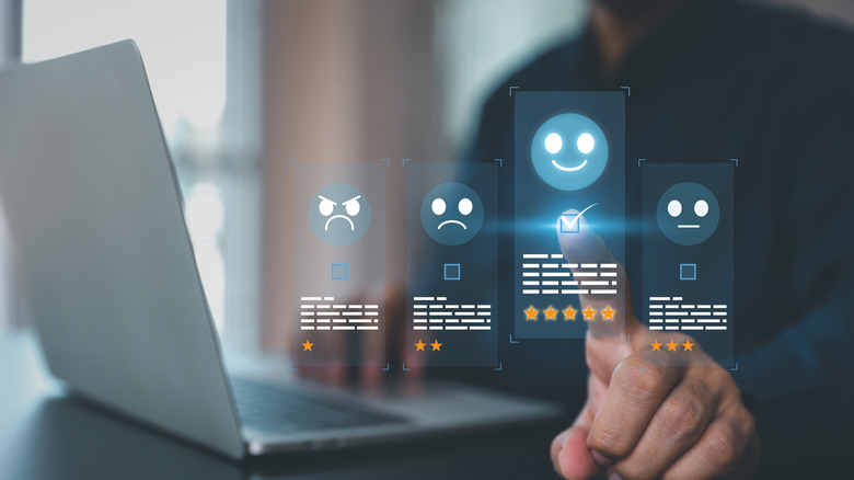 Holographic bars showing emojis for user review categories