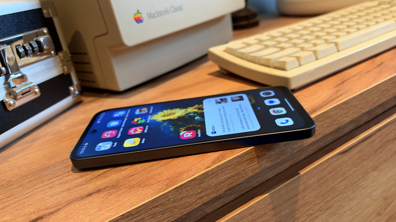 Close-up of the TCL P80 Ultra on a desk with bloatware highlighted