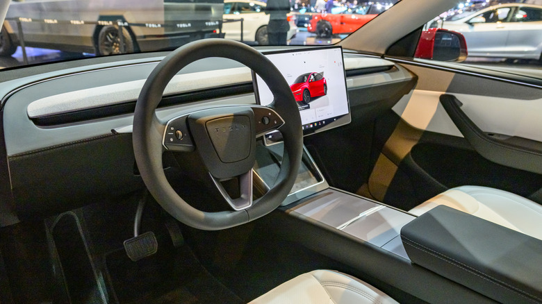 Tesla Model Y interior on display at a trade show