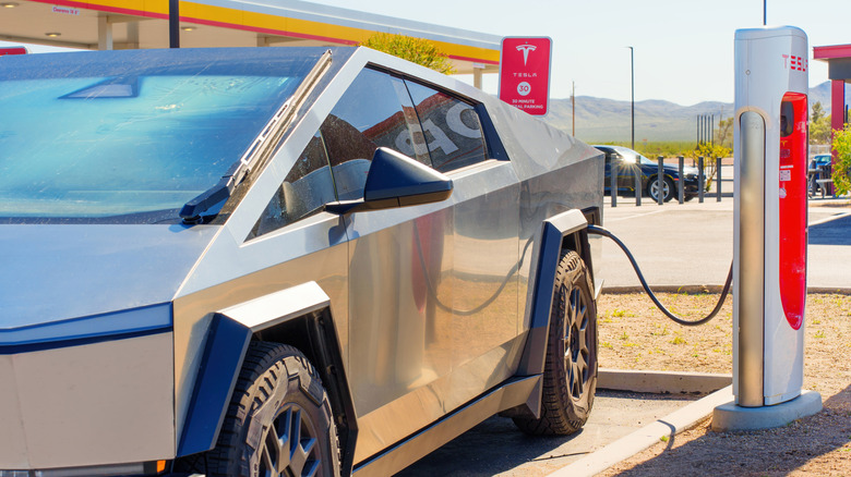 A Cybertruck at a Tesla charging station