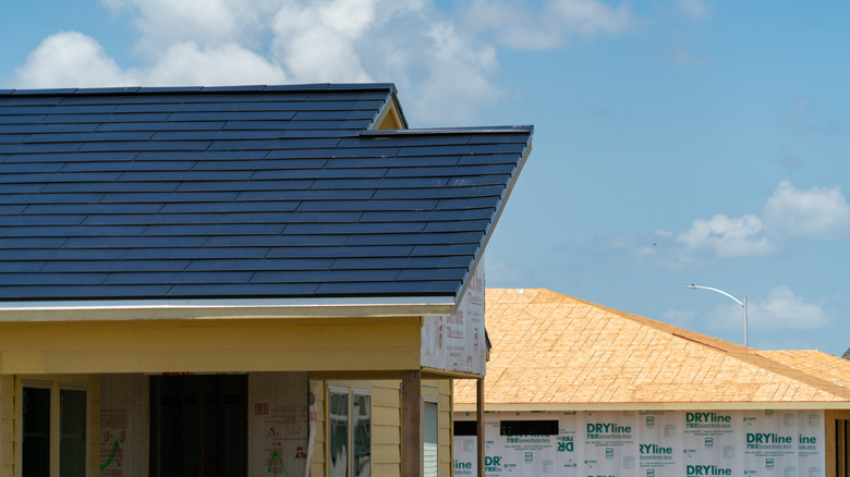 Home in Austin Texas with Tesla solar roof and blue sky in background