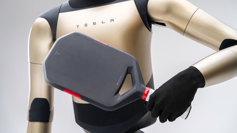 Tesla robot using its Pickleball paddle from Selkirk