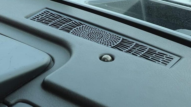 A sunload sensor on a car dashboard