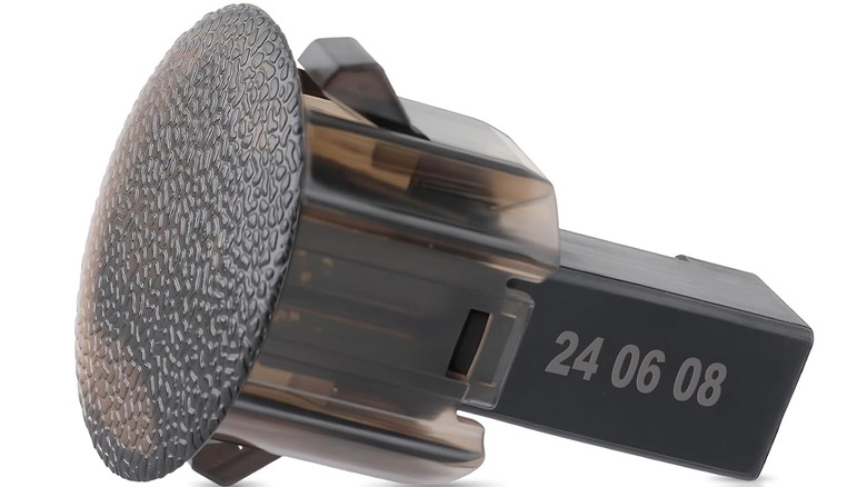 A replacement sunload sensor on a white background