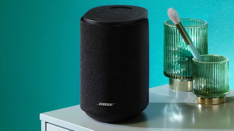 the Bose Lifestyle Ultra speaker on a shelf