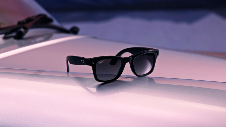 Ray-Ban Meta (Gen 2) glasses on the hood of a car