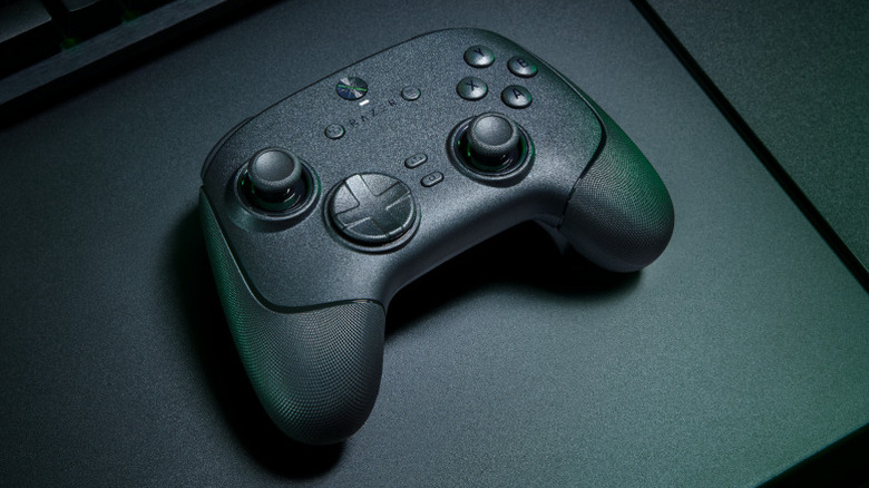 The Razer Wolverine V3 Pro 8K on a grayish-black surface