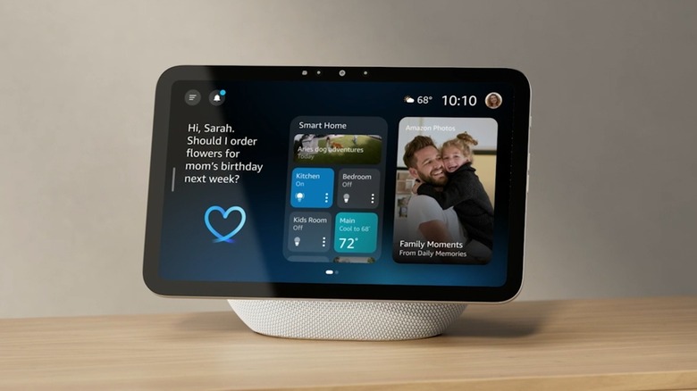The Amazon Echo Show 8 smart display on a desk, showing its home screen.