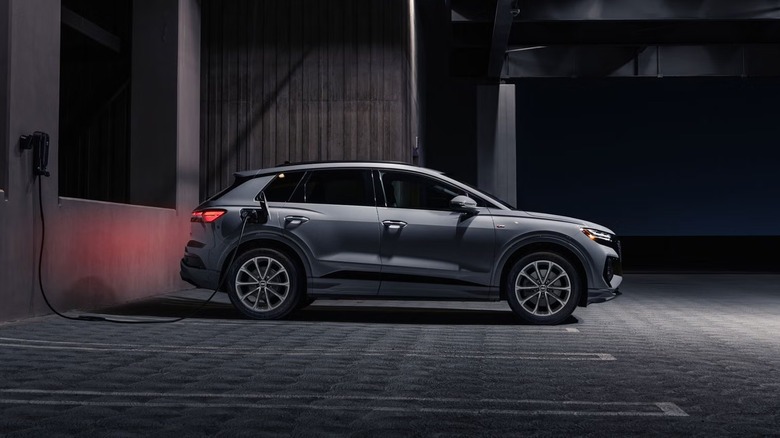 Audi q4 e-tron charging in a parking lot