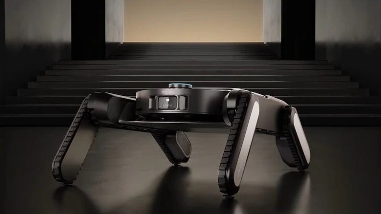 Dreame Cyber X withg robot vacuum being carried on four walking legs that look like chainsaws