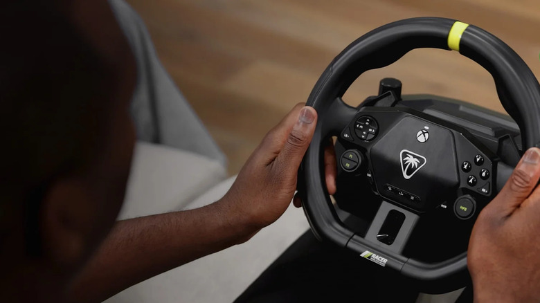 A person holding the Turtle Beach Racer