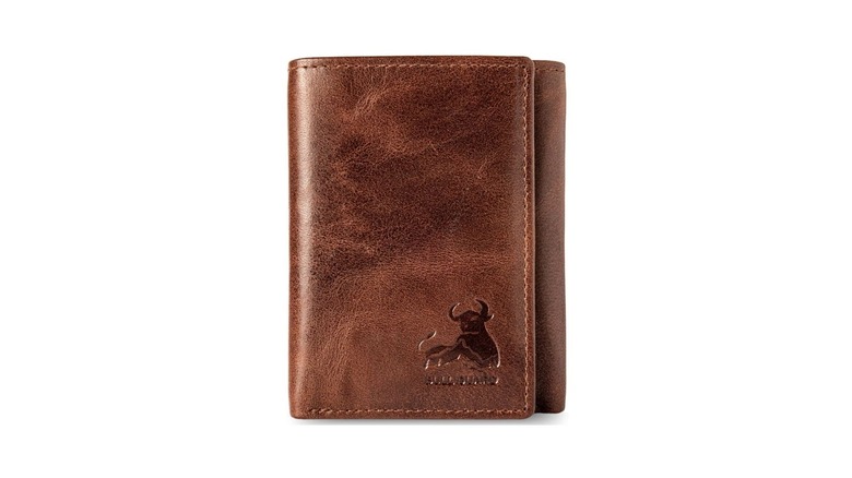 A high-quality leather wallet with a bull symbol, which is bull guard's logo, at the lower right side of its front