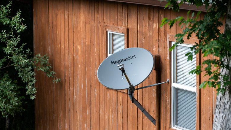 HughesNet satellite dish on a wall