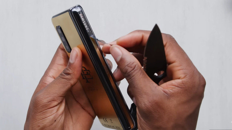 Samsung Logo covered by gold foil on the Escobar fold 2