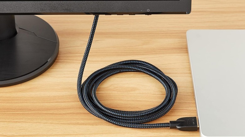 A laptop connected to a monitor using Amazon Basics HDMI cable