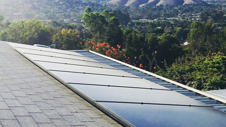 Jinko Solar solar panels on top of a home's roof.