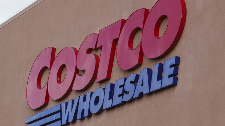 A Costco logo is displayed outside one of their stores in San Diego, CA.