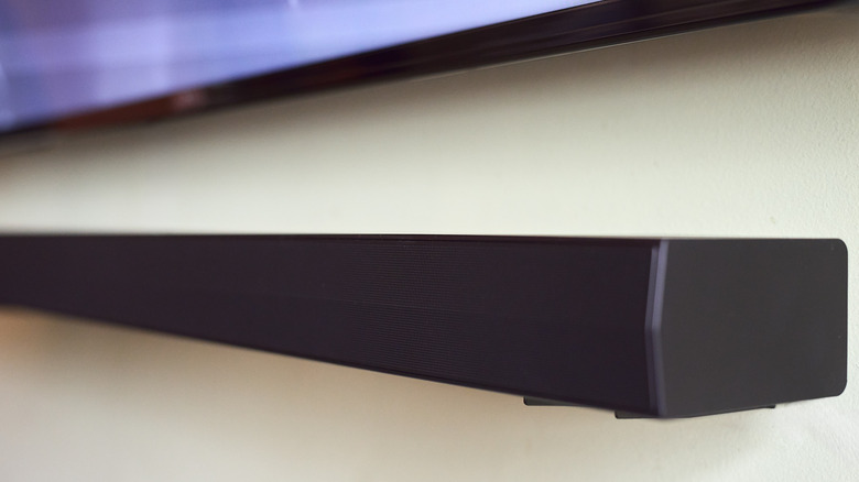 A soundbar mounted below a TV