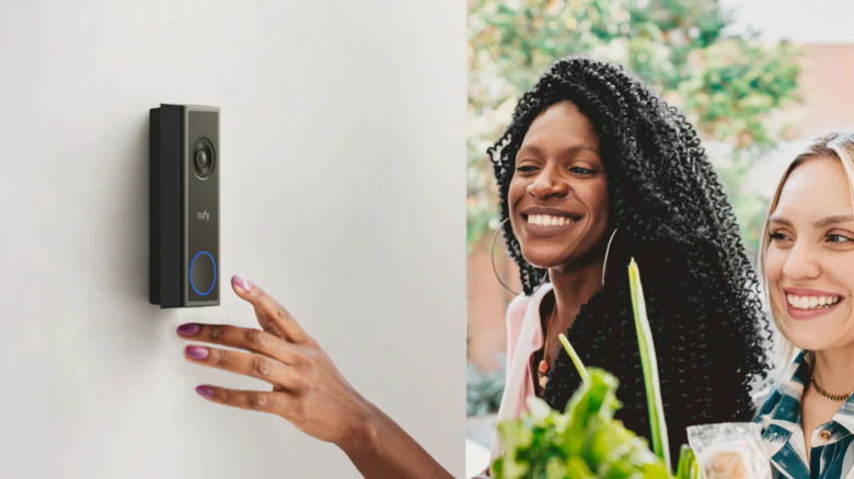 Two visitors ringing the Eufy Video Doorbell C31 outside someone's home