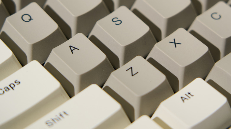 Closeup of beige keycaps on mechanical keyboard