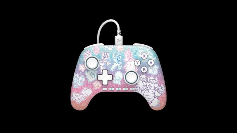 A PowerA wired Nintendo Switch 2 controller with a white buttons on a blue, purple, and pink Mario-themed design