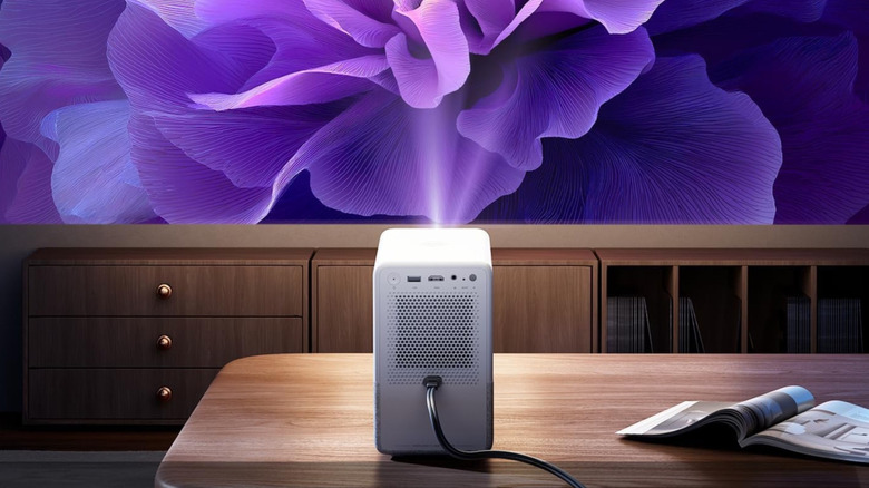 The Aurzen EAZZE D1R Cube Roku TV Smart Projector.
