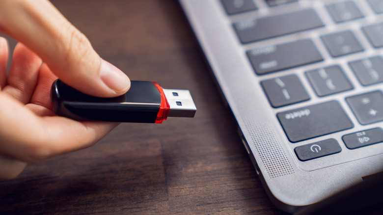 Inserting a flash drive into a laptop