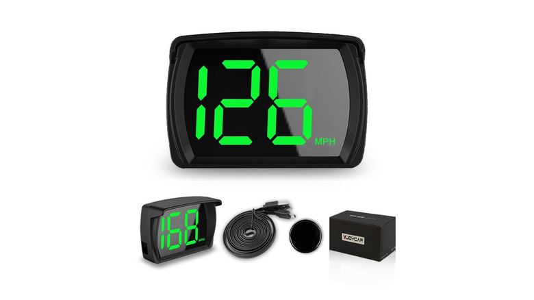 Vjoycar Speedometer HUD with a green display and other accessories.