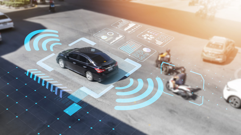 Car depicted using sensors and wireless signals.