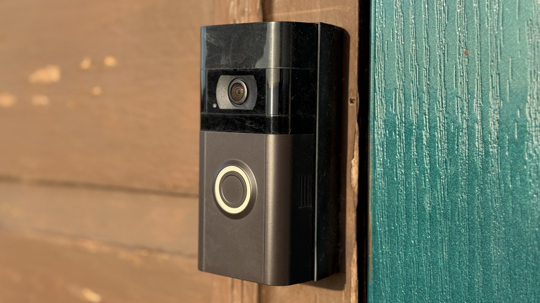 A Ring Video Doorbell mounted on a wall