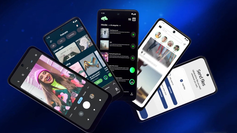 Five Motorola Moto G 5G (2023) smartphones floating together, showing different apps on their screens.