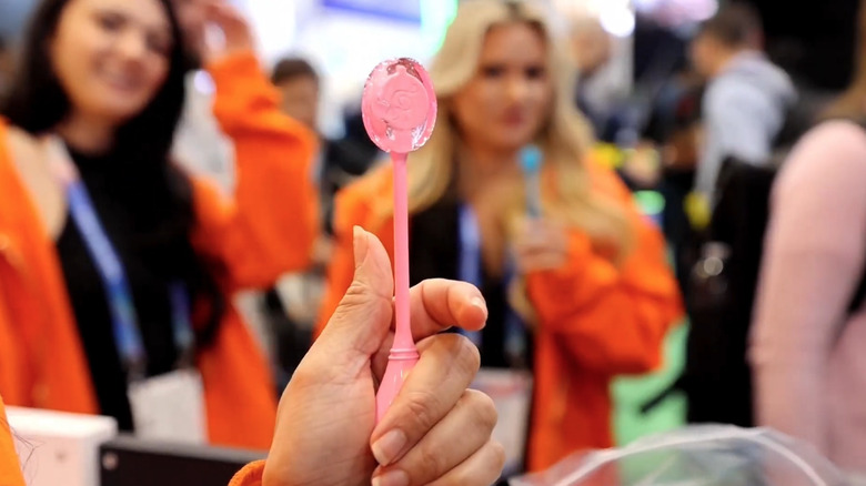 Hand holding Lollipop Star music playing lollipop