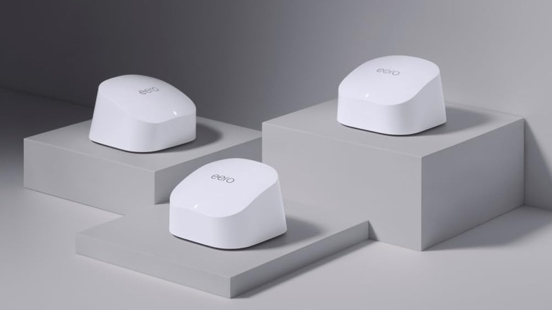 Amazon eero 6 mesh wifi system on a gray background.