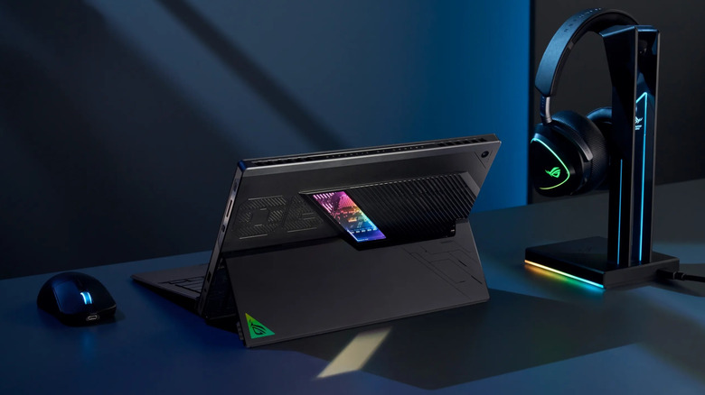 The Asus ROG Flow Z13 on a desk surrounded by peripherals