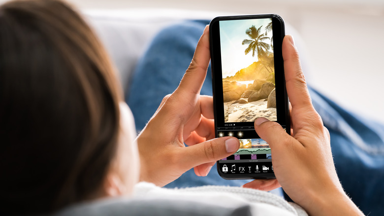 Woman editing photo on phone