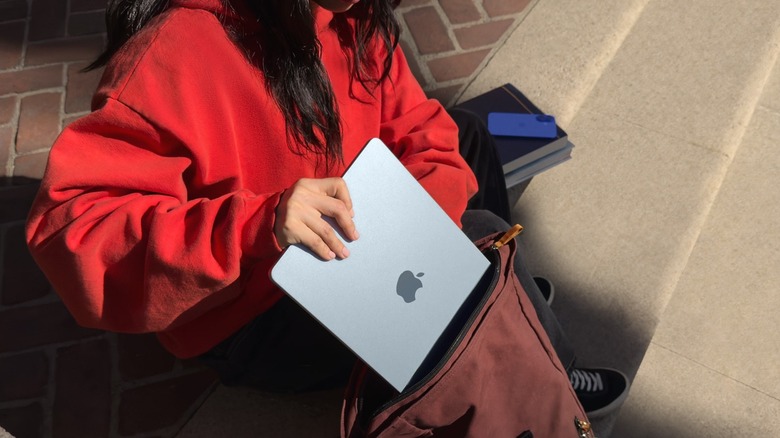 Apple highlights how thin and portable the 13-inch M4 MacBook Air is