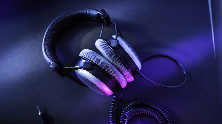 Top view of professional mastering headphones in a home recording studio.