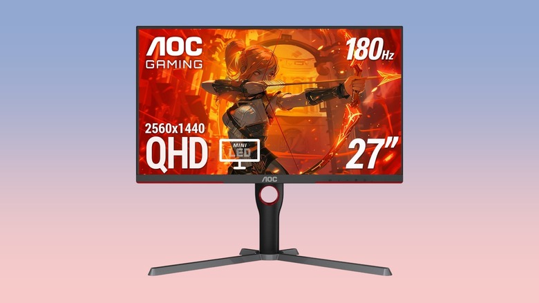 The AOC Q27G3XMN against a gradient background