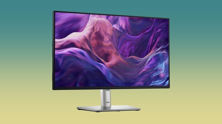 The Dell P2425H monitor against a gradient background