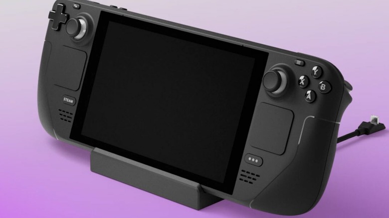 A Steam Deck in its docking station over a purple gradient background.