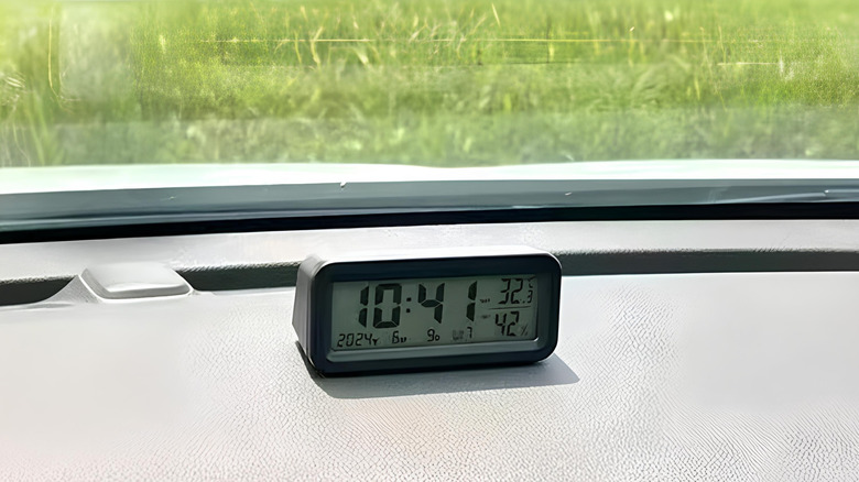 The Timloon Car Dashboard Clock sitting on a car dashboard